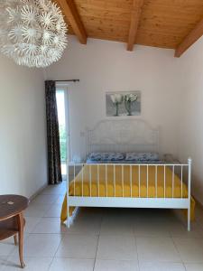 Un pat sau paturi într-o cameră la B&B Villa Sveva