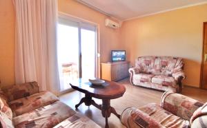 Posezení v ubytování Apartments Mušović