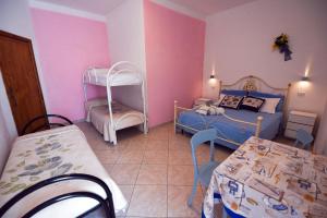 Кровать или кровати в номере B&B Miramare