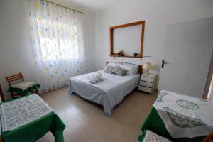 Кровать или кровати в номере B&B Miramare
