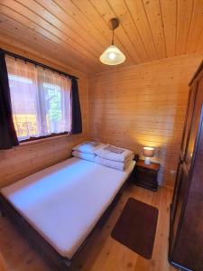 Ένα ή περισσότερα κρεβάτια σε δωμάτιο στο ALBATROS Wicie
