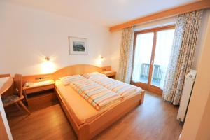 Letto o letti in una camera di Pension Panorama