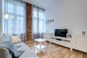 TV a/nebo společenská místnost v ubytování Apartament Chlebnicka II
