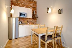 Kuchyň nebo kuchyňský kout v ubytování Apartament Chlebnicka II
