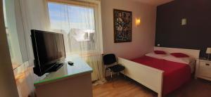 Łóżko lub łóżka w pokoju w obiekcie Słoneczny Dom pokoje i apartament na wynajem