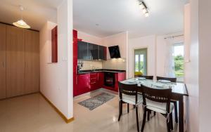 Kuchyň nebo kuchyňský kout v ubytování Adria Apartments