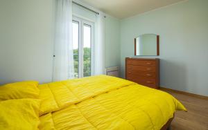 Postel nebo postele na pokoji v ubytování Adria Apartments