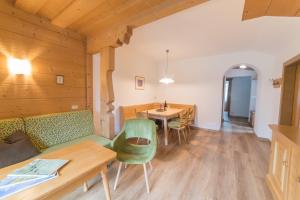 Posezení v ubytování Pension Apartments Pardell