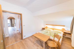 Postel nebo postele na pokoji v ubytování Pension Apartments Pardell