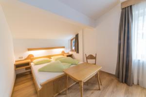 Postel nebo postele na pokoji v ubytování Pension Apartments Pardell