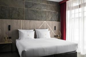 Posteľ alebo postele v izbe v ubytovaní Nosalowy Park Hotel & Spa
