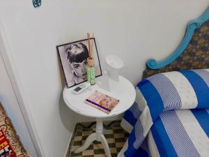 Posteľ alebo postele v izbe v ubytovaní La finestrella dell’arte un orizzonte da guardare
