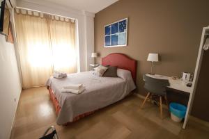 En eller flere senge i et værelse på B&B Porta di Ponte