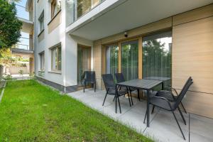Vonkajšia záhrada v ubytovaní Comfort Apartments Dolny Sopot