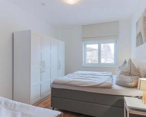 Ένα ή περισσότερα κρεβάτια σε δωμάτιο στο Appartement Almblick