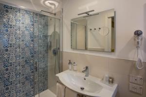 Koupelna v ubytování Almalux Jesolo Wellness & Spa 3 stelle superior
