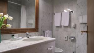 Koupelna v ubytování Savoia Palace Hotel