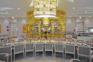 a large dining room with a long table and chairs at Crowne Plaza Bursa Convention Center & Thermal Spa, an IHG Hotel in Bursa