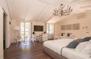 Ένα ή περισσότερα κρεβάτια σε δωμάτιο στο Terra Prime Suite