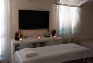 Μια τηλεόραση ή/και κέντρο ψυχαγωγίας στο Terra Prime Suite