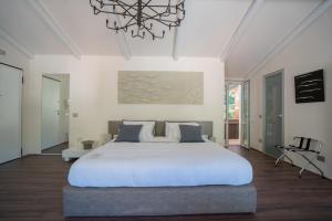 Ένα ή περισσότερα κρεβάτια σε δωμάτιο στο Terra Prime Suite