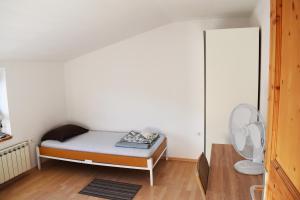 Postel nebo postele na pokoji v ubytování Rooms Busija