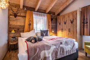 Letto o letti in una camera di The Kaprun Edition - Luxury Chalets & Style Suites