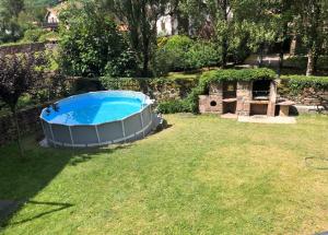 a large swimming pool in the yard of a backyard at Martintzenea in Sumbilla