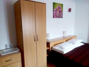 Postel nebo postele na pokoji v ubytování Vila Rocco
