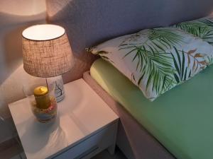 Postel nebo postele na pokoji v ubytování Apartment Mia