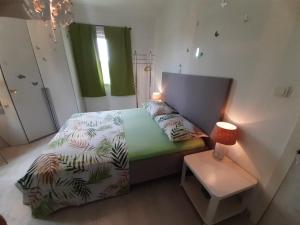 Postel nebo postele na pokoji v ubytování Apartment Mia