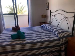 Кровать или кровати в номере Apartamento en pleno Parque Natural Cabo de Gata, Isleta del Moro
