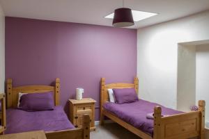 Postel nebo postele na pokoji v ubytování Cú Chulainns Accommodation