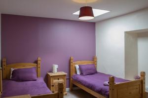 Postel nebo postele na pokoji v ubytování Cú Chulainns Accommodation