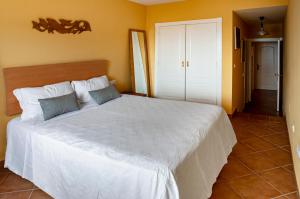 Кровать или кровати в номере CASA LA ISLETA PLAYA