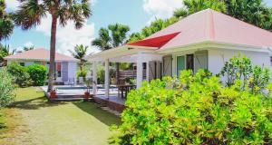 a small white house with a red roof at Dream Villa Lorient 659 in Saint Barthelemy