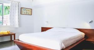Tempat tidur dalam kamar di Dream Villa Lorient 659