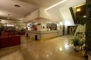 a lobby of a hospital with a waiting room at Hotel Milano in Pistoia