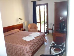 Postel nebo postele na pokoji v ubytování Hotel L'Ancora