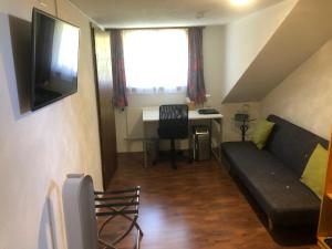 TV a/nebo společenská místnost v ubytování Hotel Freihof