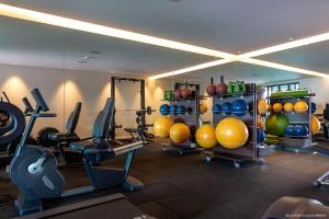a gym with several exercise equipment in a room at Dream Villa Corossol 776 in Saint Barthelemy