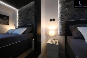 Postel nebo postele na pokoji v ubytování Legacy Marine2 - Zadar, Luxury Suites