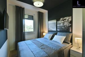 Säng eller sängar i ett rum på Legacy Marine2 - Zadar, Luxury Suites