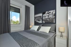 Postel nebo postele na pokoji v ubytování Legacy Marine2 - Zadar, Luxury Suites