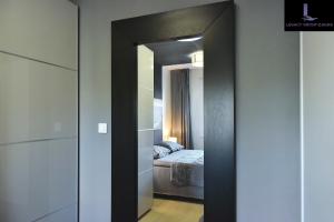 Postel nebo postele na pokoji v ubytování Legacy Marine2 - Zadar, Luxury Suites
