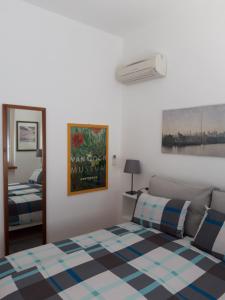 Posteľ alebo postele v izbe v ubytovaní Casa Marilla