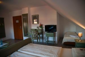 Ein Bett oder Betten in einem Zimmer der Unterkunft Flair Hotel Reuner