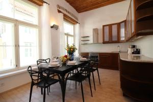 A kitchen or kitchenette at Tallinn City Apartments - Old Town
