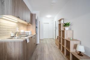 Kuchyň nebo kuchyňský kout v ubytování BpR Brody Street Home