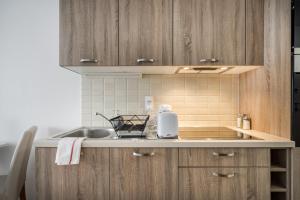 Kuchyň nebo kuchyňský kout v ubytování BpR Brody Street Home